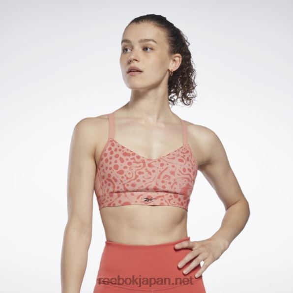 女性 ラックス ストラップ モダン サファリ プリント スポーツ ブラ Reebok 峡谷のサンゴ 0P408813